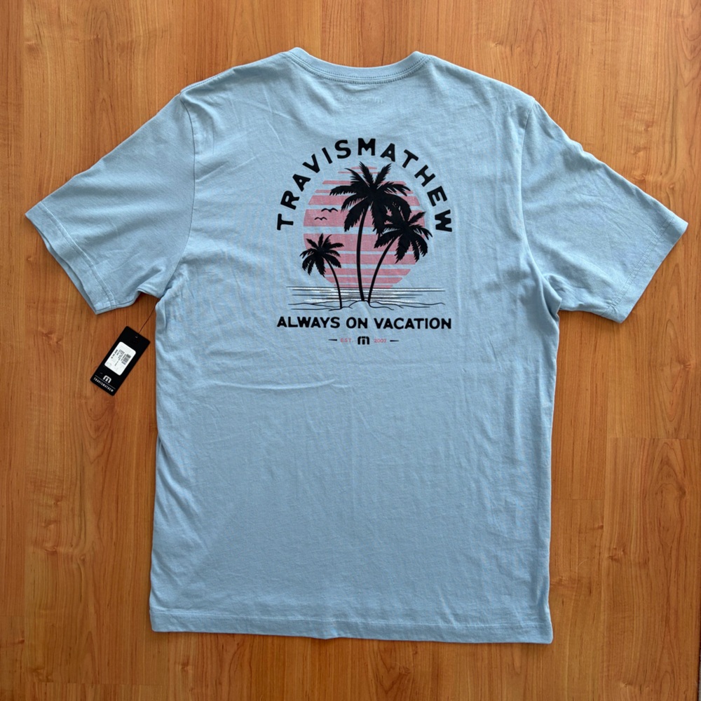 Travis Mathew Sky Blue Tee with Pink Sunset and Black Palms